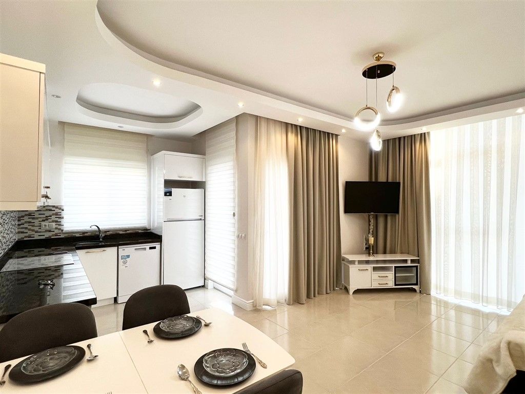 Furnished apartment 1+1 in popular Mahmutlar district 