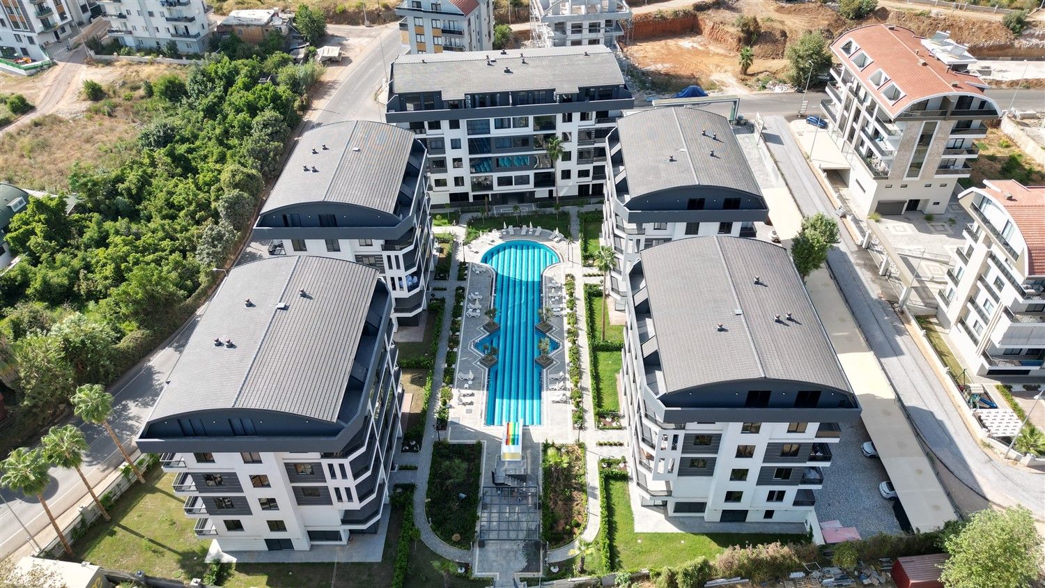 Apartments 1+1 and 2+1, residential complex surrounded by orange orchards