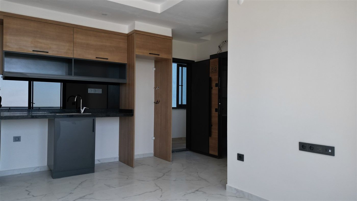 Apartment 1+1 in new building - district Mahmutlar, Alanya