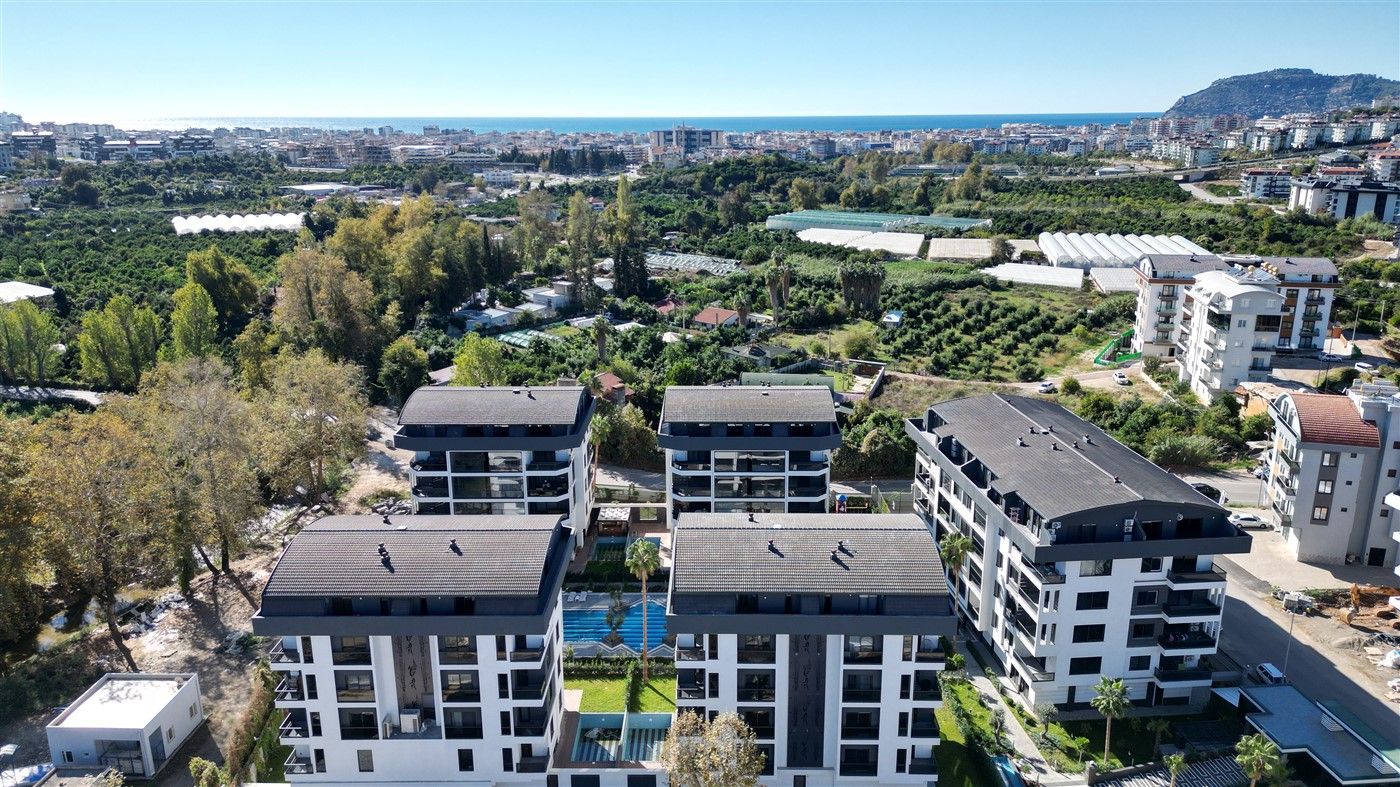 Apartments 1+1 and 2+1, residential complex surrounded by orange orchards