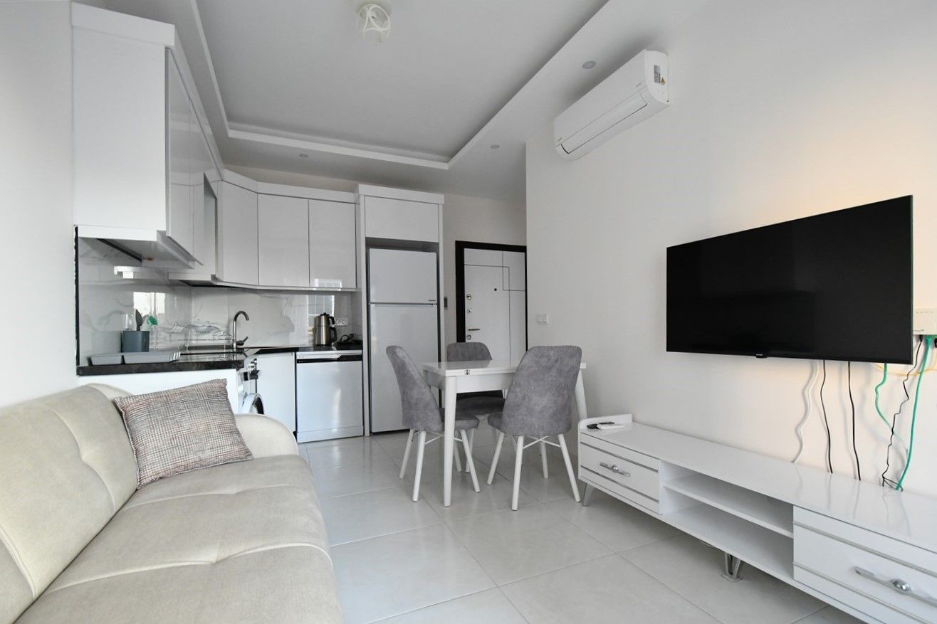 Rent 1+1 apartment in new building, good location in Mahmutlar