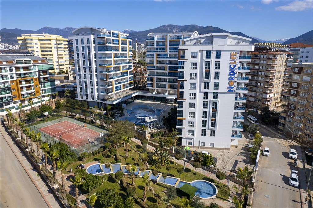 Fully furnished 1+1 apartment with sea and pool views in the Tosmur area