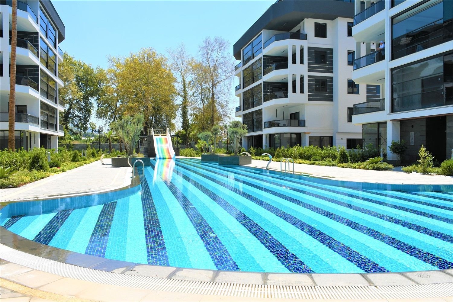 Apartments 1+1 and 2+1, residential complex surrounded by orange orchards