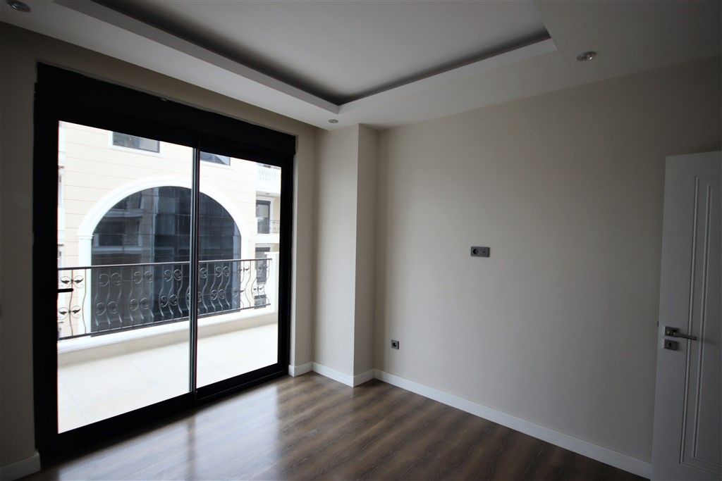 New 3+1 apartments with separate kitchen in the center of Alanya